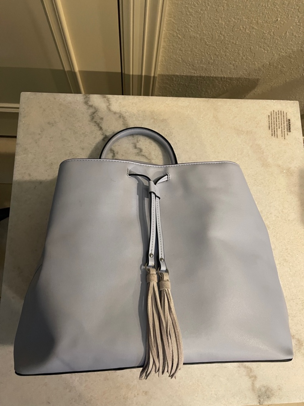 French Connection Light Gray Hobo Tote with Tassel Accent